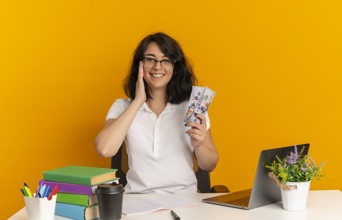 A happy life coach with earned money and wealth